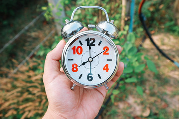 An Alarm Clock Set To 8 AM to Represent Time That People Going to Work
