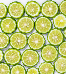 Sliced bergamot on white