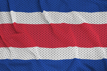 Costa Rica flag printed on a polyester nylon sportswear mesh fabric with some folds