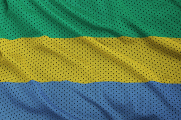 Gabon flag printed on a polyester nylon sportswear mesh fabric with some folds
