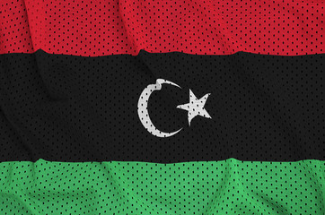 Libya flag printed on a polyester nylon sportswear mesh fabric with some folds