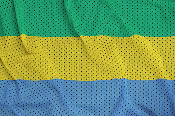 Gabon flag printed on a polyester nylon sportswear mesh fabric with some folds