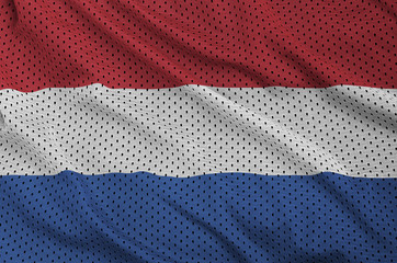 Netherlands flag printed on a polyester nylon sportswear mesh fabric with some folds