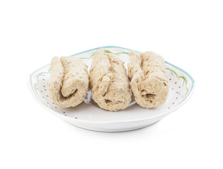 Indian Sweet Gajak Food Also Know As Dry Fruit Roll Isolated on White Background