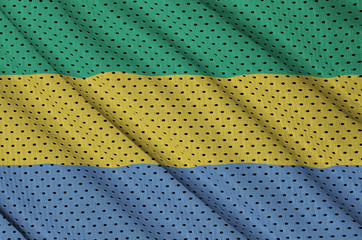 Gabon flag printed on a polyester nylon sportswear mesh fabric with some folds