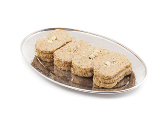 Indian Sweet Gud Kaju Gajak Isolated on White Background