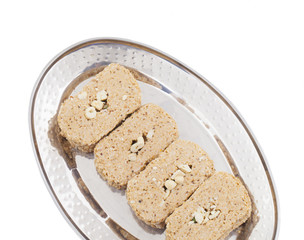 Indian Sweet Gud Kaju Gajak Isolated on White Background