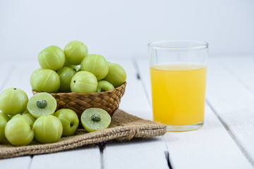 Indian gooseberry on wooden table