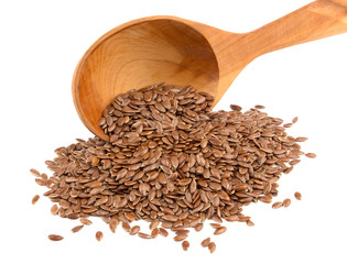 Flax seeds in wooden spoon isolated on white background