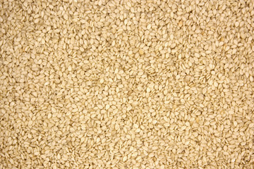 White sesame seeds background