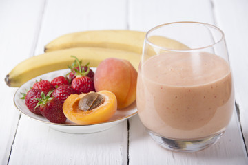 Smoothies with apricot, strawberry and banana