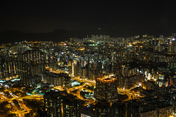 Illuminated Kowloon aerial view at night