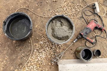 mixture of concrete in a bucket at a construction site