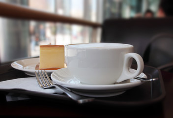 Fototapeta na wymiar A cup of coffee in the cafe