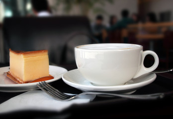 Fototapeta na wymiar A cup of coffee in the cafe