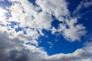 Clouds on a blue sky as a background
