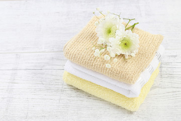 Fototapeta na wymiar Towels on wooden table