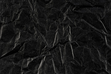 abstract background with black wrinkled paper