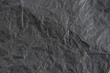 abstract background with black wrinkled paper