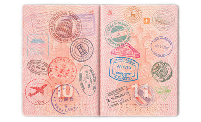 Visas, stamps, seals in the passport. Background with various countries