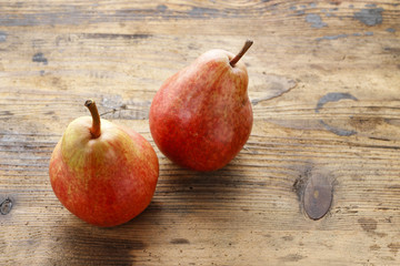 Pears on wooden table.