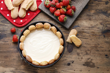 Making strawberry cheese cake.