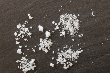 Close up white salt on a black background