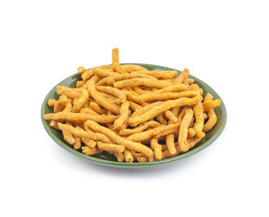 Sev is a popular Indian snack food consisting of small pieces of crunchy noodles made from chickpea flour paste, which are seasoned with turmeric, cayenne, and ajwain before being deep-fried in oil.