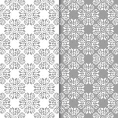 White and gray set of floral seamless patterns