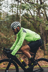 Obraz premium Professional cyclist riding bike outdoors