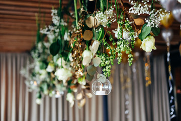 Wedding floral decor. Green and golden eucalyptus leaves.