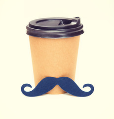 Paper cup for coffee or tea with a mustache. Men's concept, father's day.