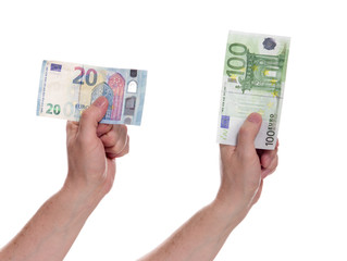Euro money in hands on a white background. A man's hand holds twenty and one hundred euro notes. Euro currency.