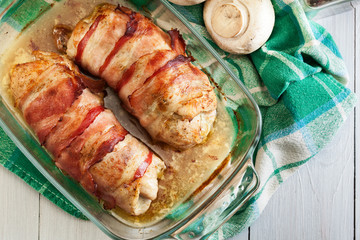 Baked chicken breast stuffed with champignon