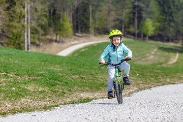 child enjoy his bicycle
