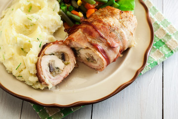 Chicken breast stuffed with champignon