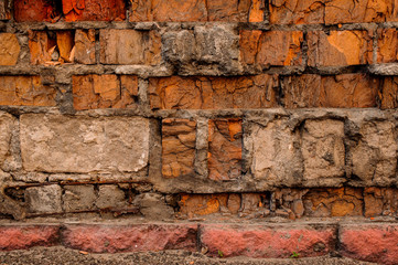 Cracked concrete vintage brick wall detailed background