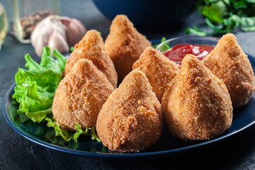Coxinha. Fried croquette with chicken