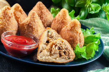 Coxinha. Fried croquette with chicken