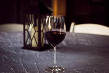Wine Glass and Lantern on Fancy Table