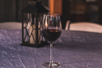 Wine Glass and Lantern on Fancy Table