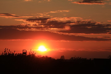 Fototapeta premium Sonnenuntergang, Abendrot mit Wolken 