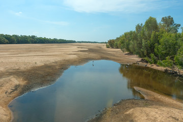 Birds in the almost dry Gilbert River in the outback of Queensland in Australia