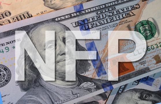 Text NFP( Non farm pay roll ) with background Dollar Bank Note , Business concept.