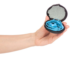 Headphones in a case in hand