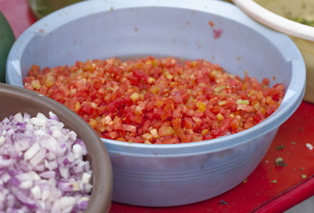 A pile of chopped raw tomato