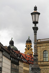 Obraz premium Theatinerkirche cupola and Theatiner Strasse, Munich, Germany