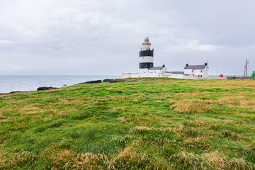 Fototapeta na wymiar Landscapes of Ireland. Hook Head lighthouse
