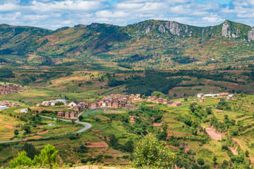 Fototapeta na wymiar Rice terraces and Merina villages along the National Route 7 South of Tananarivo, Madagascar