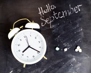 Close up vintage clock on blur background.